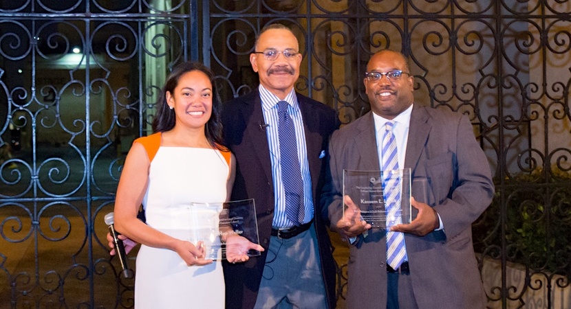 Rick Palmore, Founding Chair of LCLD, presents the 2018 Rick Palmore Award to Merisa Heu-Weller and Kassem Lucas. (Photo by Jay Haas)